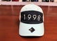 Soem-Baseball-Vati-Hut-Schwarzweiss-- weiches Druck-Logo 1998, das Plastikschnalle spinnt