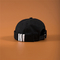 Hohe Qualität gestickte gerollte Kappen, kundengebundene Plastikschnallen-Hafenarbeiter-Kappen, gewaschene schwarze Hüte ohne Rand